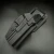 Kabura kydexowa do Pistoletu Glock 17 - Doubletap Gear na ciemnym tle.