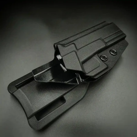 Doubletap Gear Strighter OWB do pistoletu Glock 17 na ciemnym tle.