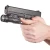 Latarka pistoletowa Streamlight_TLR-1_HL-X_USB na pistolecie Glock 17 trzymanym w dłoniach.