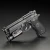 Streamlight TLR-1 HL - latarka taktyczna zamontowana na pistolecie Beretta 92F.
