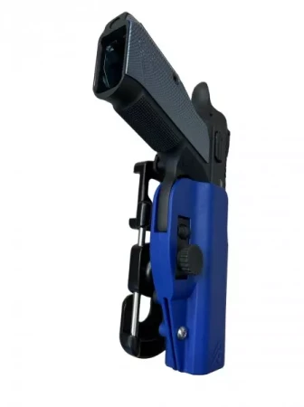 Niebieska kabura DAA Max z pistoletem Shadow 2 z mechanizmem montażowym.