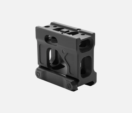 Unity Tactical podwyższony montaż kolimatora FAST Micro Footprint - Picatinny na białym tle.