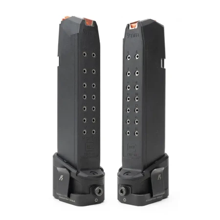 Stopki do Glock 17 zwiększające pojemność Strike Industries EMP z zamontowanymi klipsami Pocket Clip.