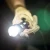 Latarka Fenix C7 LED 3000 lm włączona.