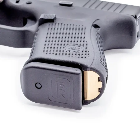 Zaślepka z mosiądzu dociążająca chwyt pistoletu Glock 19 Gen 4 i Gen 5.