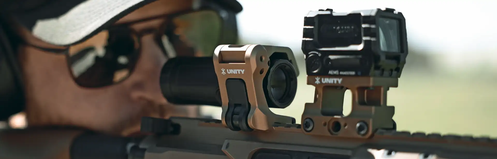Unity Tactical FAST FTC Omni QD - Montaż powiększalnika na karabinku AR-15.